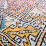 Coral-red rug with a central star medallion