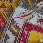 Prayer turkish carpet with a rust-red mihrab arch