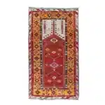 turkish carpet with a rust-red mihrab arch
